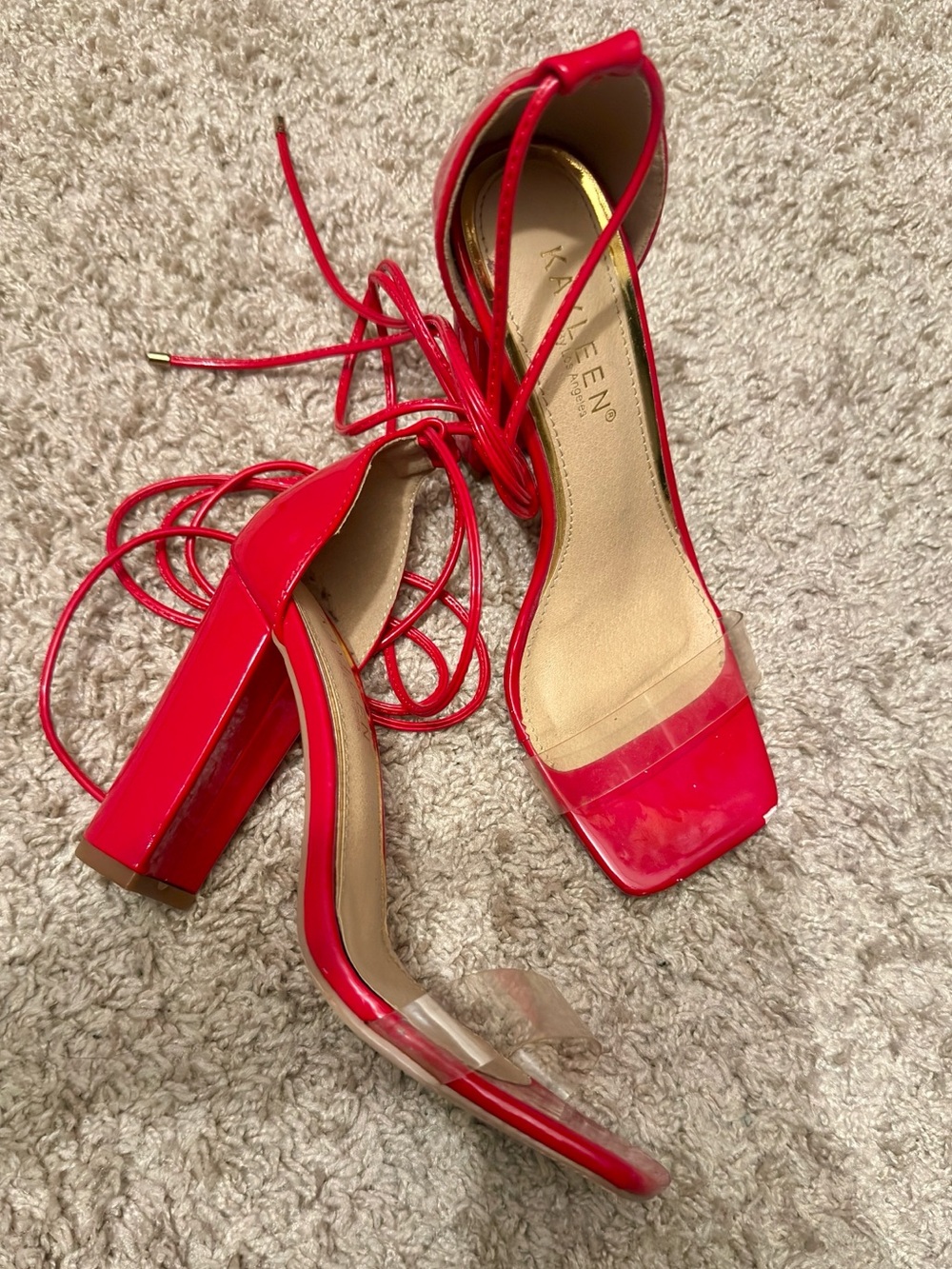 Red and clear lace-up sandals
